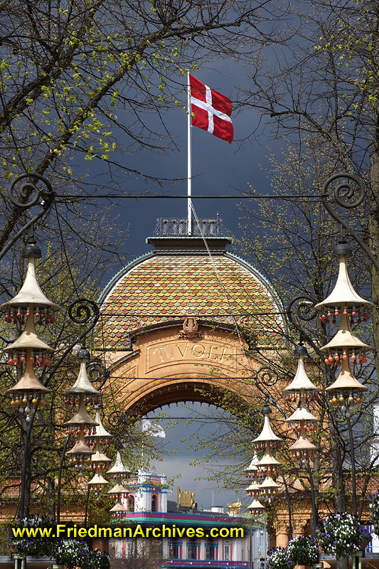 copenhagen,denmark,tivoli,gardens,entrance,flag,establishing shot,